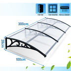 Vordach für Außentüren, transparente PC-Platten + schwarze Verstärkungsstreben, 6 mm dick, einseitig geneigtes, gewölbtes Vordach, schützt vor Sonne und Regen, vier Größen: 120 cm / 150 cm / 200 cm / 300 cm